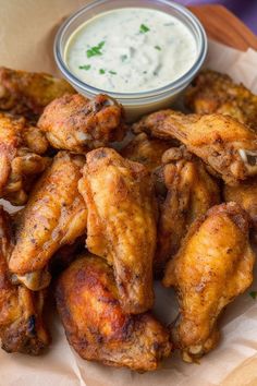 chicken wings with ranch dressing on the side