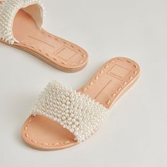 An understated sandal with beachy embellishment. DALON PEARL has a little something extra to style with flowy dresses and short shorts. Textile + Pearl Upper Recycled Synthetic Outsole Recycled Textile Lining Synthetic Sock Imported Athleisure Shoes, Pearl Sandals, Flowy Dresses, Stylish Sandals, Shoes Heels Wedges, Sweaters And Jeans, Flowy Dress, Short Shorts, Clothes Collection