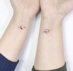 two small tattoos on the wrist