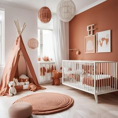 a baby's room with a teepee tent in the corner