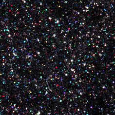 the sky is filled with multicolored confetti flecks and stars