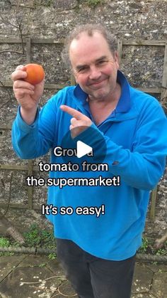 a man holding an orange and pointing to it with the caption grow tomato from the supermarket it's so easy