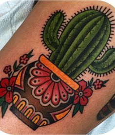 an image of a cactus with flowers on it's arm and the words, becagenesbacon