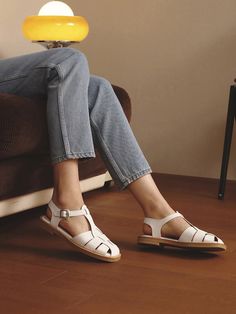 Editor's NotesMOL:pin's shoes can be matched well with girlish and casual stylings.- Trendy square shaped toe- Fisherman designed sandals- Soft and smooth cowskin- Easy to wear with buckle strapMeasurements(in.)KR size- Size: KR 225MM (US 5.5) - KR 255MM (US 8.5)- Heel height: 0.39 in.Composition & Care- Upper: Cowskin, Lining: Functional Lining- Avoid direct heat and moisture- The leather may have fine scratches and wrinkles- Keep in a dust bagDesigner- by MOL:pin White Closed Toe T-strap Sandals With Buckle, White Closed Toe Slingback Sandals With Buckle, White Closed Toe Slingback Sandals With Buckle Closure, Leather Sole T-strap Sandals With Round Toe, T-strap Sandals With Leather Sole And Round Toe, Casual Sandals With Square Toe And Medium Width, White Flat Heel T-strap Sandals With Buckle Closure, White T-strap Sandals With Open Heel For Spring, White T-strap Open Heel Sandals For Spring