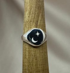 This beautiful moon ring takes its inspiration from the night sky with a unique design that will inspire many. The genuine silver  will attract freedom, independence and cosmic awareness. Perfect gift for your loved one.  FEATURES: * silver moon ring * unique artisan design * free gift wrap * free international shipping SIZE: This ring is approx 10mm by 12mm on top. Standard size for all rings is 7US. This size fits most adults but all of our rings can be changed. Please select customize at chec Celestial Silver Signet Ring, Silver Celestial Signet Ring As Gift, Celestial Silver Signet Ring For Gift, Silver Celestial Style Signet Ring For Gift, Moon Engraving, Silver Moon Ring, Engraving Ring, Planet Ring, Ring Moon