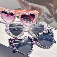 💖💖 Step into the enchanting world of our meticulously crafted heart-shaped sunglasses, where passion meets precision in every detail. Adorned with exquisite pearl embellishments, these sunglasses are a testament to artisanal artistry, perfect for your bridal ensemble. 💍💍 Elevate your bridal style effortlessly with these stunning sunglasses, designed to enhance your special moments. Whether it's your wedding day, honeymoon, bridal shower, or bachelorette party, let these shades add a touch of elegance to your bridal look. 📸📸 Planning an engagement photoshoot? Embrace the journey to "I do" with these sunglasses as the perfect accessory. Treat yourself or surprise a soon-to-be bride - these shades are guaranteed to sparkle and shine! 🎨🎨 Capture pure joy in every selfie with these pear Pearl Glasses, Bridesmaid Glasses, Personalised Glasses, Embrace The Journey, Heart Shaped Sunglasses, Engagement Photoshoot, Bridal Looks, Eyewear Sunglasses, Bridal Style