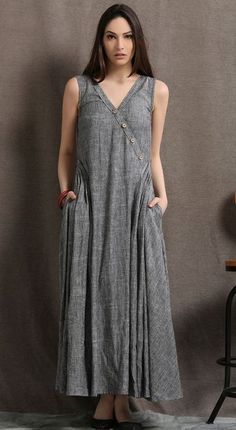 A-line Sundress Maxi Dress With Pockets, Casual Gray Sleeveless Maxi Dress, V-neck Sundress Maxi Dress With Pockets, A-line Sundress Maxi With Pockets, Elegant Sleeveless Maxi Dress With Pockets, Casual Maxi Dress With Slip Pockets, Casual Long Dress With Pockets, Casual Sleeveless Maxi Dress With Pockets, Casual Sleeveless Maxi Dress With Slip Pockets