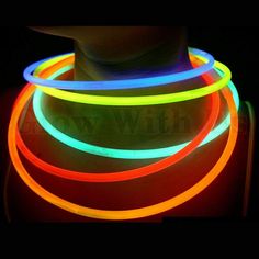 neon glow bracelets are glowing in the dark