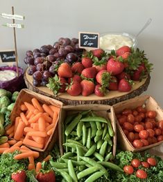 there are many different fruits and vegetables on the table with each one's own name