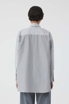 This striped shirt blouse is made of soft cotton fabric – woven in portugal and 100% made of organic cotton. it comes with patchwork details chest pockets side slits and pearl buttons. slightly longer in the back.    - relaxed fit  - back length: 30.9” (size s)  - model (5'11'') wears size s  - made in portugal Patchwork Shirt, Blouse Sale, Fit Back, Leather Blazer, Pearl Buttons, Charcoal Color, Striped Blouse, Mens Denim, S Models