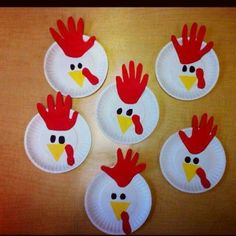 paper plates with red and white roosters on them