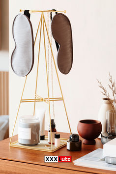 a wooden table topped with lots of items