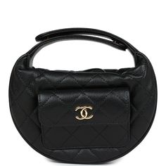 This Mini Round Hobo Pouch Bag is in Black caviar leather with gold tone hardware, tonal stitching, features a halfmoon round shape, snap top handle, front coin pocket with gold tone CC signature logo, zipper closure, one interior slit pocket. The interior is lined in black grossgrain and leather with one slip pocket.Collection: 23B (RFID chip)Origin: ItalyCondition: New and never wornAccompanied by: Chanel dustbag, Retail UPC, and ribbonMeasurements: 5.5" width x 4.5" height x 1.25" depth; 3" d Christmas Offers, Handbag Collection, Chanel Mini, Black Caviar, Handbag Wallet, Hermes Bags, Wallet Accessories, Vuitton Bag, Pouch Bag