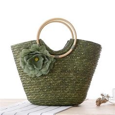 Origin: CN(Origin)Main Material: StrawShape: Casual ToteGender: WOMENOccasion: VersatileExterior: NONELining Material: PolyesterPattern Type: SolidDecoration: AppliquesInterior: No PocketHardness: HARDStyle: CasualClosure Type: zipper Bohemian Handbags, Holiday Handbag, Woven Purse, Bucket Tote Bag, Boho Tote Bag, Boho Tote, Straw Beach Bag, Summer Handbags, Straw Handbags