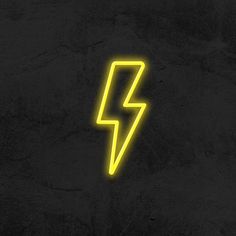 a neon sign that is on the side of a wall with a lightening bolt