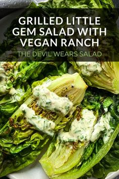 grilled lettuce salad with vegan ranch on a white plate and text overlay