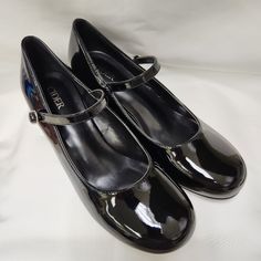 Cider Black Patent Leather Chunky Heeled Mary Jane Shoes Women's Size Eu 39/Us 9 Pre-Owned But Never Worn, No Scuffs Or Scratches Adjustable Strap Heel Is 2.2" Made In China Black Patent Leather Mary Jane Court Shoes, Black Mary Janes With Low Heel And Medium Width, Black Wide Fit Round Toe Heels, Black Mary Janes With Medium Width And Low Heel, Black Closed Toe Mary Jane Court Shoes, Black Low Heel Mary Janes For Party, Black Mary Jane Court Shoes With Closed Toe, Formal Black Platform Mary Janes, Black Flat Heel Mary Jane Court Shoes