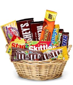 a basket filled with lots of different types of candy