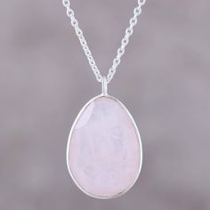 Centering this pendant necklace, a single egg of glistening rose quartz weighs eight carats. Neetu Barathi designs this necklace from India, which features faceted gems of rose quartz and smoky quartz along its sterling silver cable chain. Rose Quartz Teardrop Jewelry, Elegant Teardrop Necklace With Large Stone, Natural Stones Jewelry With Rose Quartz, Elegant Faceted Rose Quartz Necklace, Elegant Rose Quartz Faceted Necklace, Elegant Rose Quartz Round Crystal Necklaces, Rose Quartz Jewelry With Natural Stones, Elegant Rose Quartz Round Crystal Necklace, Elegant Round Rose Quartz Crystal Necklace