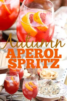 an orange and red drink in glasses with the words autumn aperoli spirits on it