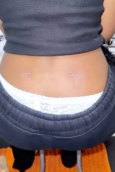 Back Thermal Piercing, Crossed Industrial Piercing, Back Dermals Black Women, Heart Dermal Piercing