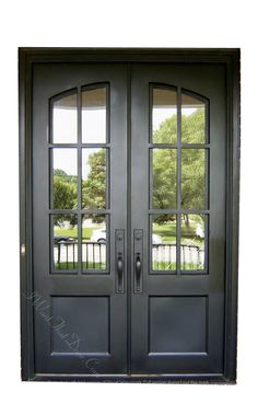 a black double door with two sidelights