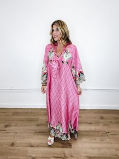 The Grace Dress is a total stunner! This elegant Pink print maxi dress features notched neck with tie, half length sleeves and side slits. This one feels so luxe! Style with flats, heels or sandals. Fits true to size. Lindsey is 5'3 and is wearing a size Small 100% Polyester Measurements: Small: Bust 20" | Length 55" Medium: Bust 21" | Length 56" Large: Bust 22" | Length 57" WE ONLY OFFER STORE CREDIT FOR RETURNS! Feel free to email us at info@emersoncharles.com or DM us with any questions regar Chic Beach Maxi Dress With 3/4 Sleeves, Chic Maxi Dress With 3/4 Sleeves For The Beach, Chic 3/4 Sleeve Maxi Dress For Beach, Elegant Maxi Dress With 3/4 Sleeves For Beach, Chic Flowy Maxi Dress With 3/4 Sleeves, Spring Vacation Midi Length Kaftan, Spring Vacation Midi-length Kaftan, Spring Vacation Midi Kaftan, Printed 3/4 Sleeve Maxi Dress For Vacation