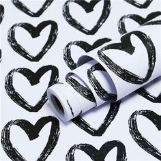 black and white hearts drawn on paper