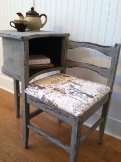 an old wooden chair with a cushion on it