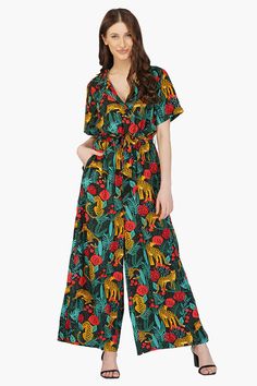 The Jaguar Paradise Jumpsuit is so bold and fabulous, that it's gone viral! This Instagram sensation will make you feel regal and brave, and turn heads everywhere you go! Animal Print Jumpsuit, Embroidered Shoulder Bag, Free Spirited Woman, Boho Jumpsuit, Animal Print Fabric, Jumpsuit For Women, Print Jumpsuit, Black Animals, Jumpsuit Party