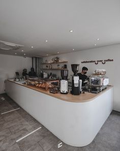 there is a coffee shop with many items on the counter