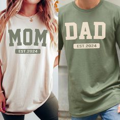 two people wearing matching t - shirts with the words'dad est 2024'on them