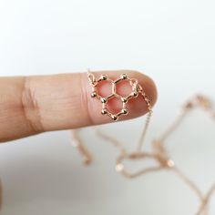 "Beautiful and lovely rose gold Water H2O Molecule pendant necklace. Made of rose gold plated Water H2O Molecule pendant with skinny rose gold chain. A simple and soft-looking dainty necklace is good for yourself or gift! Your necklace will ship in a rudiana gift box. * Rose Gold Plated over Brass * Chain length 15\"-20\" * Pendant 5/8\" x 1/2\" * Creation Time: 1 - 3 days ♥ See more Rudiana Accessories Rudiana.etsy.com" Ice Necklace, Gold Water, Rose Gold Chain, Jewelry Stand, Brass Chain, Dainty Necklace, Delicate Bracelet, Unique Rings, Rose Gold Plates