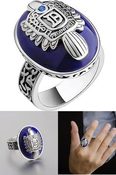 a blue ring with an ornate design on it