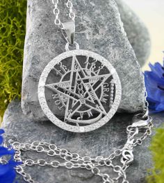 Material: 100% Sterling silver & cubic zirconia Weight: 2.4 grams More than 3/4 inch diameter (20mm) Item number: wh515 In the mid-1800's, French occultist Eliphas Levi developed this complex symbol to represent the totality of human existence. It combines two large concepts: The first is the Tetragrammaton. The root word 'tetragram' is Greek and means “consisting of four letters”. In this case, it's the four-letter Hebrew word for the unspeakable name of God. It contains the four Hebrew letters Moon Pentacle, Celtic Moon, Name Of God, Human Existence, Hebrew Letters, Celtic Tree Of Life, Nautilus Shell, Angel Wing Pendant, Feather Ring