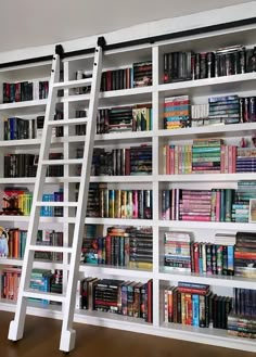 a ladder leaning up against a book shelf filled with books