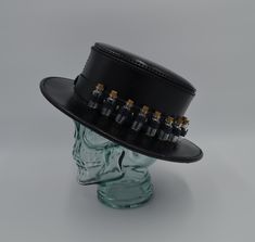 This hat is made to measure.  Message with your head size and if you will be wearing with a plague doctor mask.  (I add 2 inches to the size to allow for the thickness of the leather) Comes with 12 little glass bottles with cork stoppers 100% Genuine veg tanned leather. Hand stitched This steampunk plague doctor hat is made after the dieselpunk.ro original pattern. Hand stitched using the finest veg tanned leather and high quality waxed thread for durability. The 6oz 2-3mm 100% real leather is h Adjustable Steampunk Costume Accessories For Fantasy Events, Gothic High Crown Costume Hat For Cosplay, Gothic Fitted Top Hat For Cosplay, Fitted Gothic Top Hat For Cosplay, Gothic Adjustable Costume Hats For Fantasy Events, Adjustable Gothic Costume Hat For Fantasy Events, Adjustable Punk Mini Hat For Cosplay, Steampunk High Crown Top Hat For Cosplay, Steampunk Adjustable Hat Bands With Flat Crown