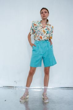 🇺🇸 US SHOPPERS - due to the situation with the post in United States, your order can take up to 3 months to arrive. Please be warned ‼️  Vintage cyan blue taylored shorts / Midi above the knee lenght high waisted bright shorts. TAG: Tail SIZE ON THE TAG: 8 MEASUREMENTS (measured lying flat)   lenght: 51 cm / 20''   waist: 35 cm / 13.5''   inseam: 22 cm / 8.5'' LELDE is 177 cm / 5'8'' tall and wears size 36/S.  CONDITION: excellent. FOLLOW US ON INSTA FOR JUICY UPDATES   https://www.instagram.com/ginger.inn/ Trendy Knee-length Shorts For Summer, Trendy Knee-length Summer Shorts, Trendy High Waist Bermuda Shorts For Summer, Trendy Fitted High Waist Bermuda Shorts, Fitted High Waist Summer Shorts, Bermuda Shorts For Spring And Summer, Fitted Shorts For Summer, Summer Bermuda Shorts With Built-in Shorts, Summer High Waist Retro Bottoms