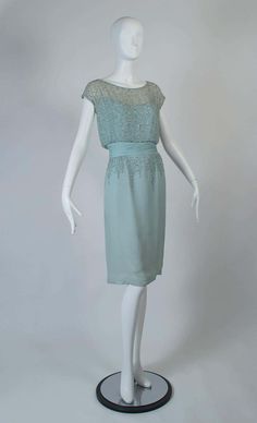 For Sale on 1stDibs - Neither mint green nor light blue, this dress’s resemblance to ocean mist is only underscored by its sparkling beaded bodice and hips. Its featherweight 1950s Style Green Evening Dress, Green 1950s Style Evening Dress, 1950s Style Green Formal Dress, Green 1950s Style Formal Dress, Vintage Light Blue Evening Dress, 1950s Clothes, 1950s Wedding Dress, Tea Gown, 1950s Outfits