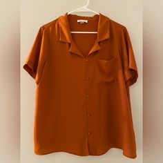 Brand: Calvin Klein Size: Large Color: Orange Never Worn Calvin Klein Collared Top For Work, Calvin Klein Casual Collared Top, Casual Collared Tops By Calvin Klein, Casual Calvin Klein Collared Top, Calvin Klein Summer Button-up Top, Calvin Klein Short Sleeve Shirt For Spring, Spring Calvin Klein Button-up Tops, Calvin Klein Spring Button-up Tops, Calvin Klein Button-up Tops For Spring