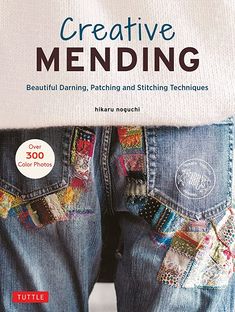 a book cover with the words creative mending on it