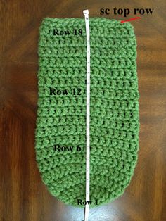 a crocheted pot holder with measurements for the top row