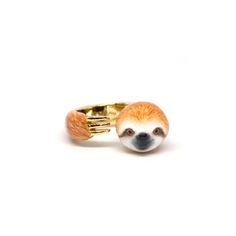 a ring with a sloth face on it