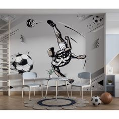 a soccer player is kicking the ball wall mural