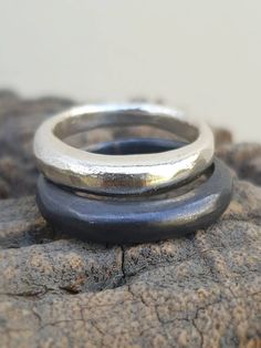 This is a Silver band asymetrical ring. It is a chunky ring with a dome shape. A Minimalist band ring that can be stackable. This ring can fit a men or a women. A unisex band ring. It can be a wedding ring or a casual everyday ring. Just choose your ring size and your finish. This listing is for one band. the ring is also available in14 karat solid gold. To see it please reffer to the solid gold section: https://www.etsy.com/il-en/your/shops/TamyZurTachshit/tools/TamyZurTachshit/il-en/listings/s Modern Adjustable Rings With Thick Band, Handmade Minimalist Round Band Rings, Minimalist Handmade Rings With Round Band, Minimalist Handmade Round Band Ring, Minimalist Handmade Wide Band Promise Ring, Chrome Hearts Ring, Marquise Cut Engagement Ring, Casual Earrings, Chunky Ring