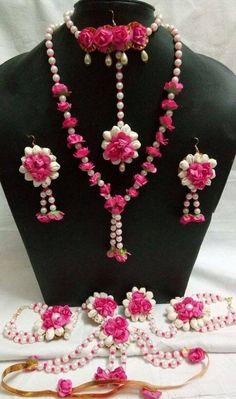 a pink and white necklace with matching earrings