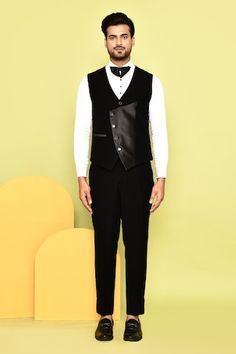 Black tuxedo with stone embroidery and pintuck detail. Paired with asymmetric waistcoat, white shirt, pant and stone embroidered bow. - Aza Fashions Fitted Black Nehru Jacket For Groom, Festive Formal Fitted Vest, Stone Embroidery, Geometric Stone, Embroidered Bow, Shirt Pant, Black Tuxedo, Tuxedos, Italian Fabric