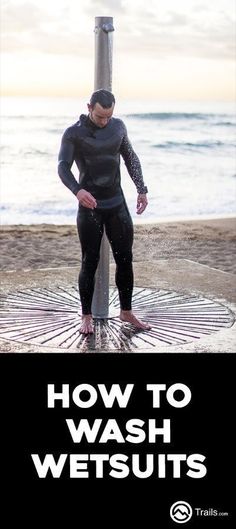 a man in wetsuit standing on top of a pole next to the ocean with text overlaying how to wash wetsuits