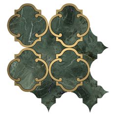 a green marble tile with gold accents