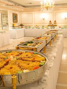 a buffet with many different types of food on it